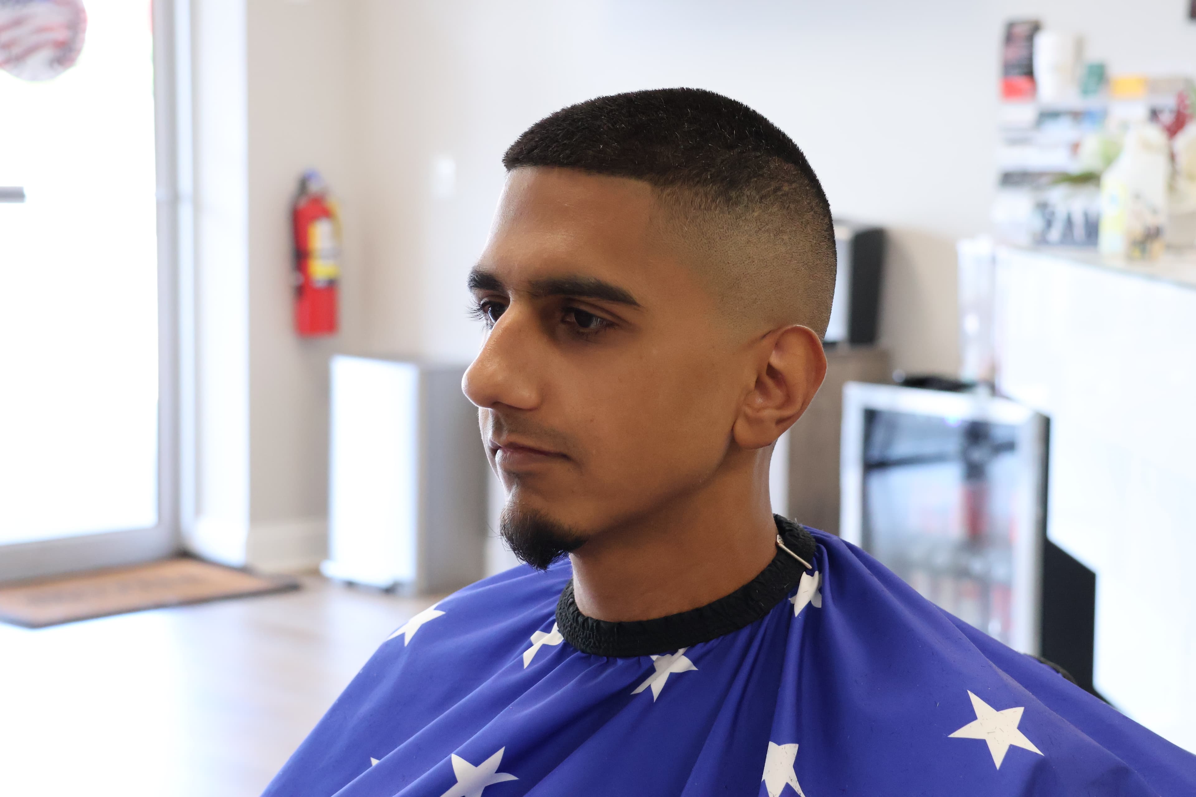 After skin fade with crisp blend and sharp line-up