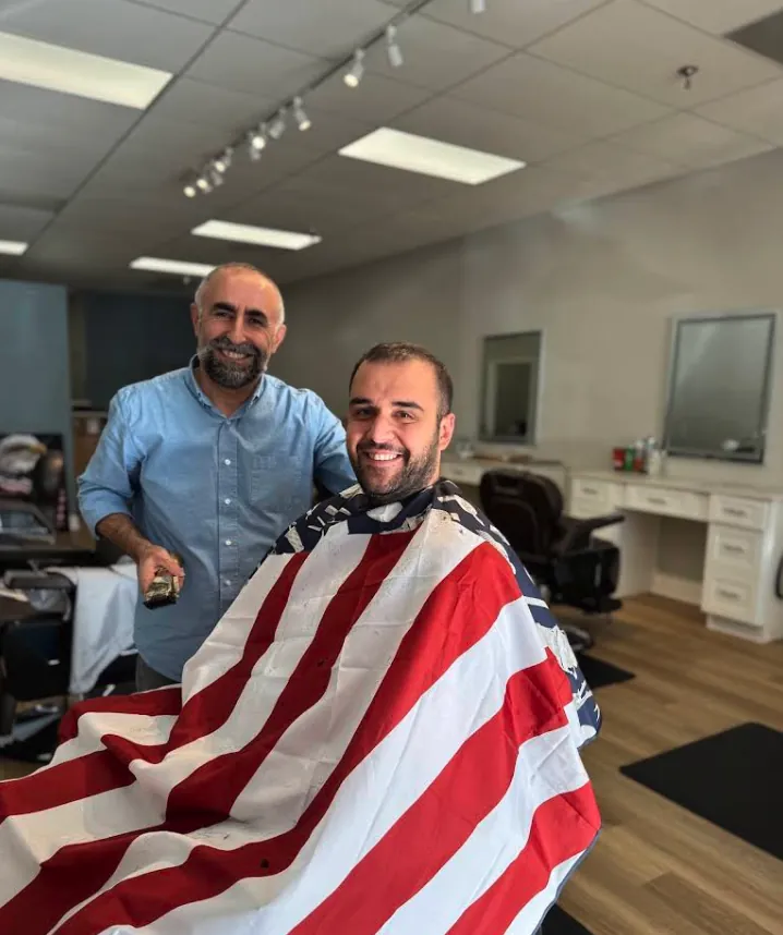 Hasim with a happy customer